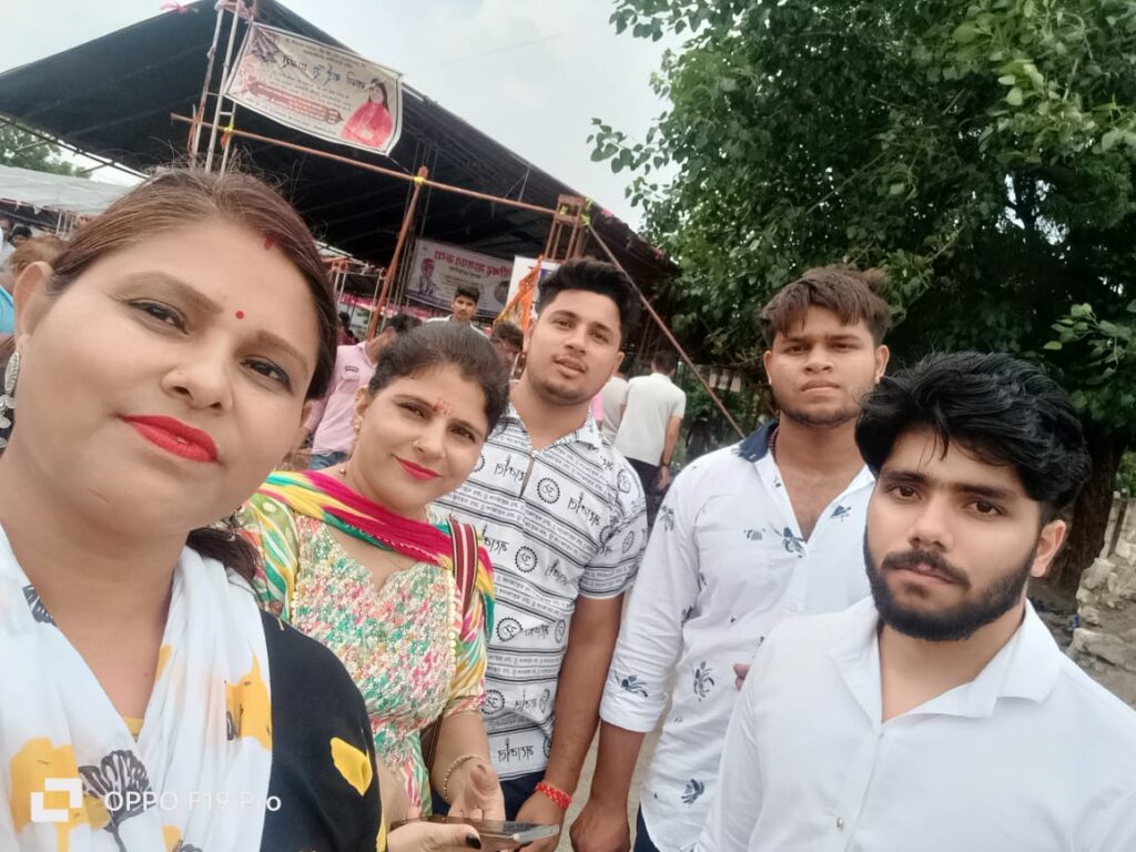 group photo of two womenand 3 men on a trip of ujjain