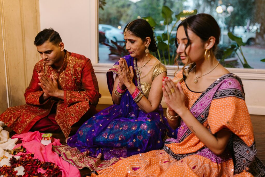 A family of three is worshipping god on diwali